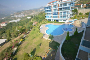 Flat with Sea View Shared Pool & Gym in Alanya